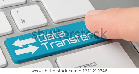 Foto stock: A Keyboard With A Blue Labeled Button - Data Transfer