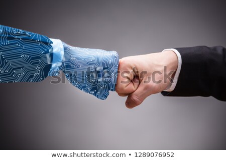Zdjęcia stock: Digital Generated Human Hand And Businessman Making Fist Bump