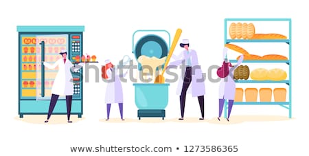 Foto stock: Worker Packing Candies At Confectionery Shop