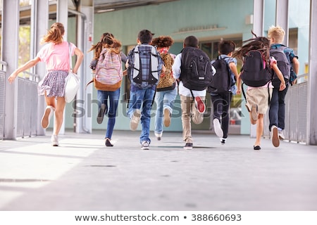 Stock fotó: Back To School Children In A Row With Backpacks