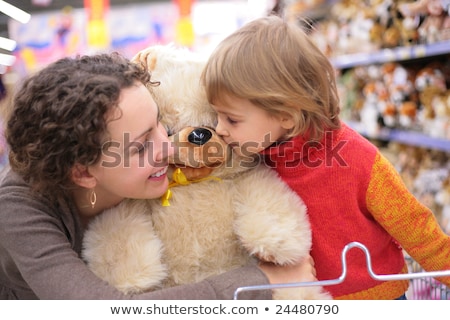 Zdjęcia stock: Girl With Soft Toy In Shop