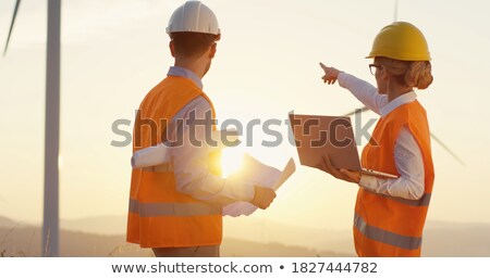 Foto stock: Some Windmills And A Man