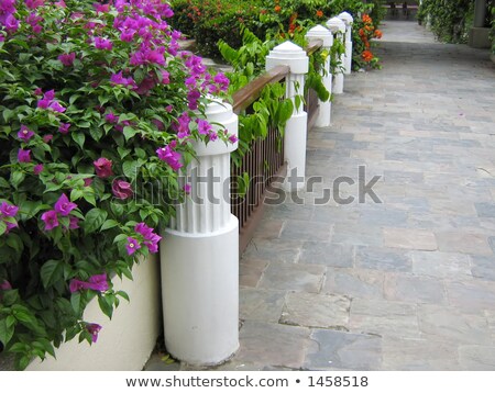 Stock photo: Fence Made Out Of Stone Pillars