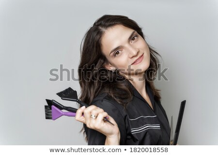 Stockfoto: Pretty Woman Smiling And Holding Brush In His Hand