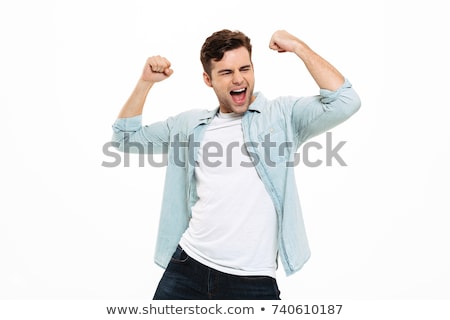 Stock photo: Young Man Winner Hands Up