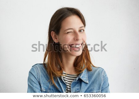 Stock photo: Beauty Portrait Of A Young Woman With Fresh Skin Winking