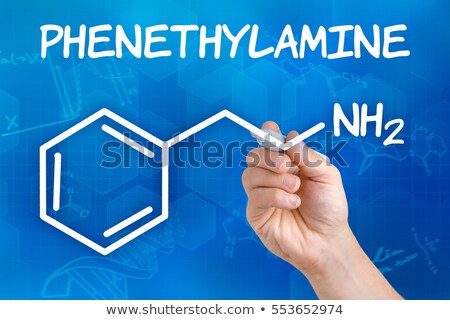 Foto stock: Hand With Pen Drawing The Chemical Formula Of Phenethylamine