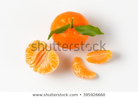 ストックフォト: Whole And Sliced Tangerines