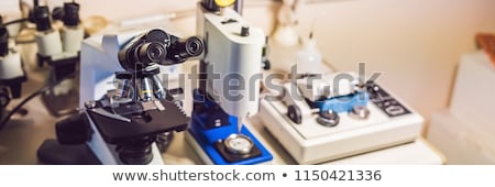 Сток-фото: A Sample Preparation Table In A Laboratory With An Optical Microscope Ultrasonic Cutter System And