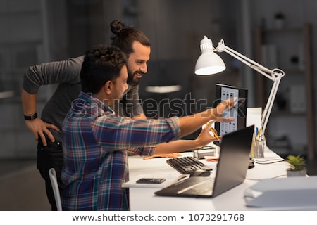 Foto stock: Web Designer Working On User Interface At Office