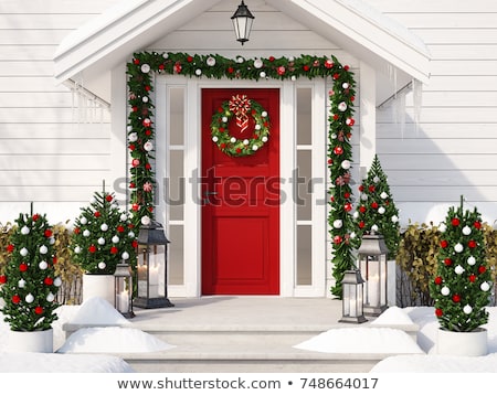 [[stock_photo]]: Christmas Decorations At Front Door Of House