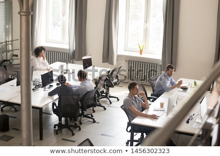 ストックフォト: Online Business Workers Performing Tasks At Work