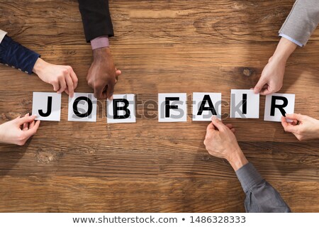 Foto stock: Business People Hands Arranging Job Fair Word