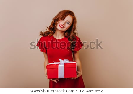 Foto stock: Christmas Girl Holding Present