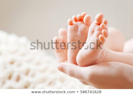 Stok fotoğraf: Feet Of Baby With Parents