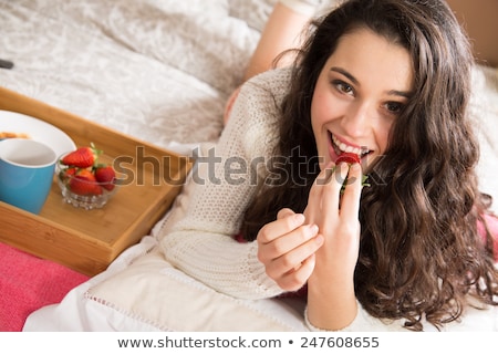 Stock photo: Portrait Of Woman With A Strawberry