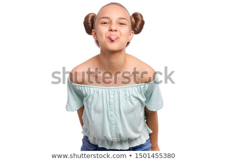 Foto stock: Cheerful Girl Shows Tongue