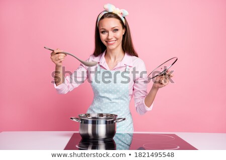 Stockfoto: Portrait Of A Smiling Cheery Housekeeper