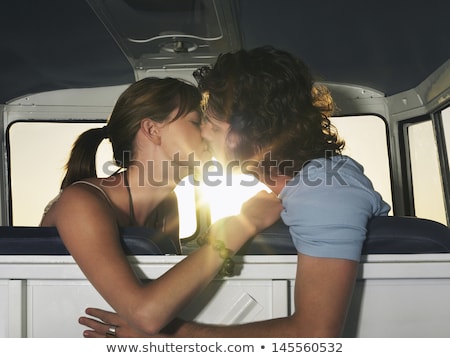 ストックフォト: Kissing Couple On The Journey