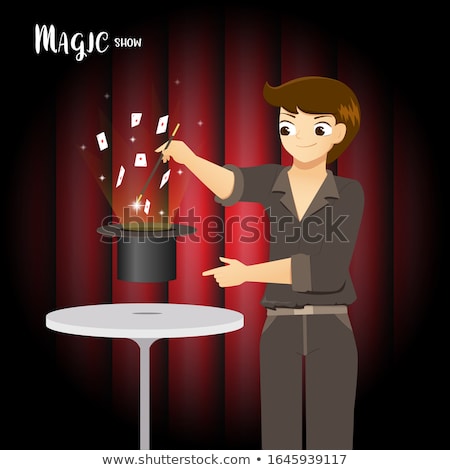 Zdjęcia stock: Magician Making Trick With Wand And Playing Cards