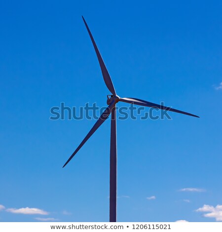 [[stock_photo]]: Aerogenerator Windmill In Sunny Blue Sky