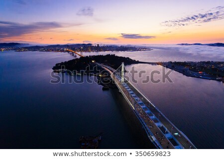 Stock fotó: San Francisco Skyline And Oakland Bay Bridge At Blue Hour