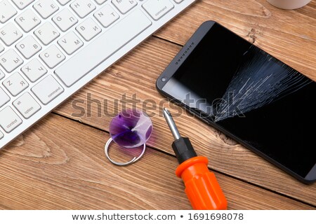 Imagine de stoc: Screwdriver Lying On The Phone