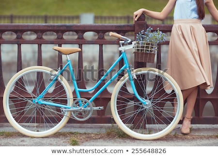 Stockfoto: Young Beautiful Elegantly Dressed Woman With Bicycle