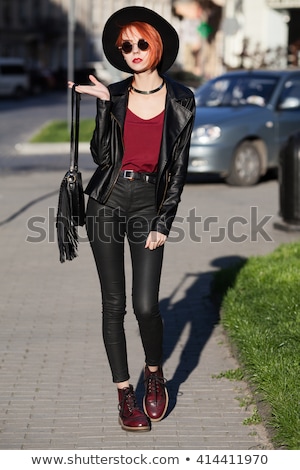 Stok fotoğraf: Fashion Model Wearing Leather Pants And Jacket