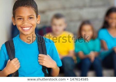 Foto stock: Cheerful African American Primary School Girl With Backpack