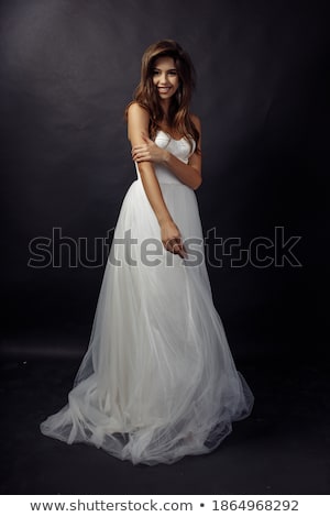 Imagine de stoc: Full Length Photo Of Brunette Woman With Long Dark Hair Smiling