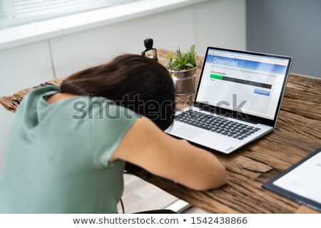 Foto stock: Woman Fell Asleep White Waiting For Slow Download