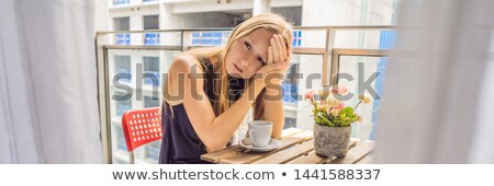 Сток-фото: Banner Long Format Young Woman On The Balcony Annoyed By The Building Works Outside Noise Concept