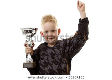 [[stock_photo]]: Little Boy Has Won The Trophy Cup