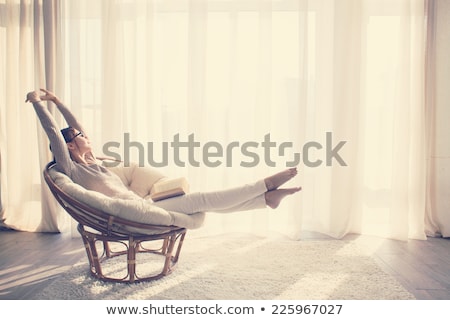 [[stock_photo]]: Young Woman Resting On Sofa