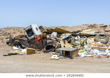 Imagine de stoc: Pollution By Garbage And Old Rusty Car Near Arrecife