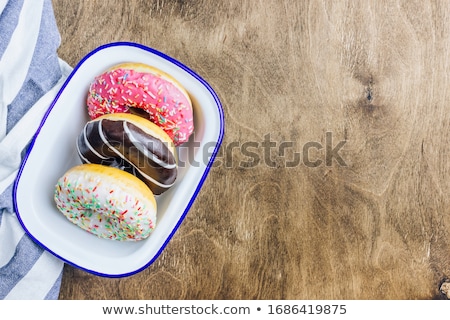Foto stock: Colorful Donuts Breakfast Composition With Different Color Styles
