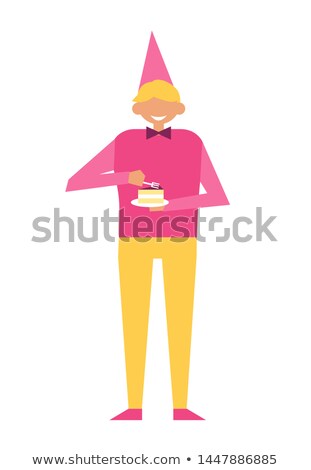 Zdjęcia stock: Man In Festive Cap And Piece Of Cupcake Isolated