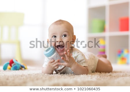 Stok fotoğraf: Babies With Baby Bottle