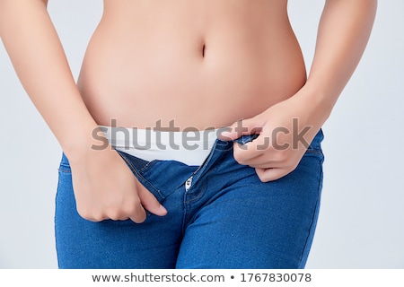 Foto stock: Woman Takes Off Her Panties Isolated On White Background