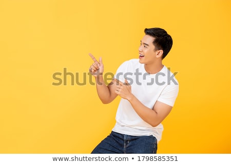 Stockfoto: Portrait Of A Smiling Young Asian Man