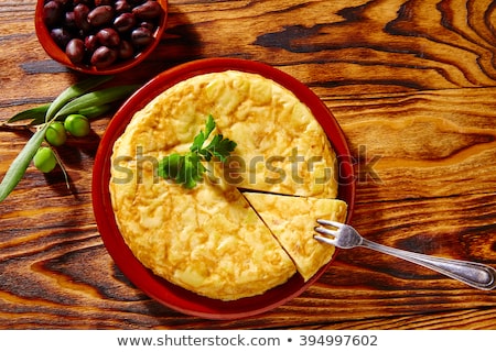 Foto stock: Preparing Tortilla De Patatas Spanish Omelette