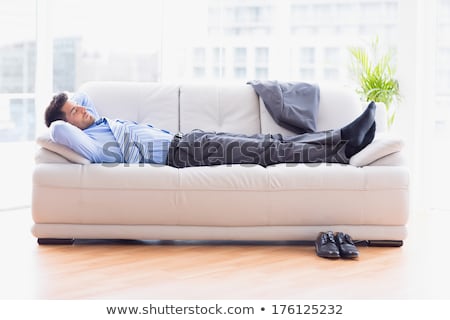 Сток-фото: Businessman Sleeping On A Sofa