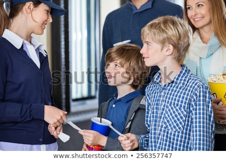 Foto stock: Woman Ticket Taker