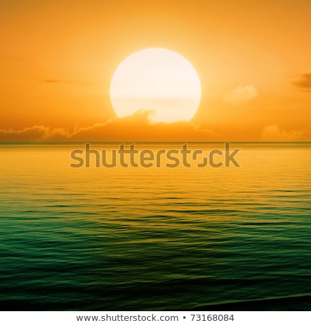 Golden Orange Sunset In A Clear Sky Over The Ocean Stockfoto © Serg64