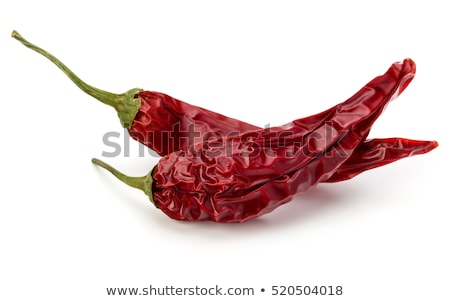 Foto stock: Spicy Red Hot Cayenne Peppers Drying In Sun