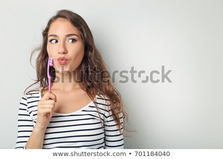 Stock photo: Beautiful Woman With A Toothbrush