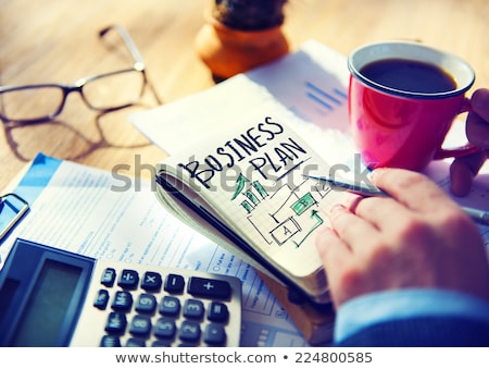 Stock fotó: Business Man Writing Business Plan