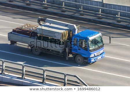 Stok fotoğraf: Crane Carrying A Cargo