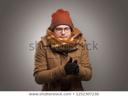 Stock fotó: Handsome Boy Freezing In Warm Clothing